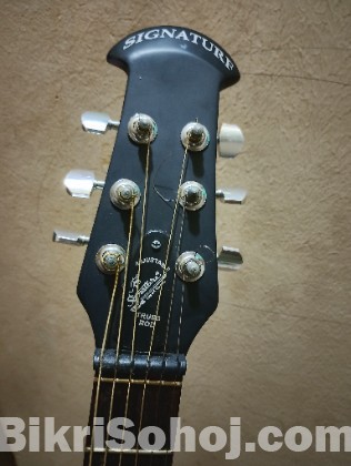 Signature Topaz 265 Semi-Acoustic black guitar.